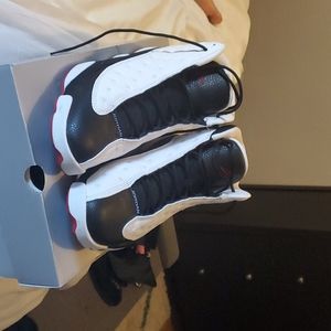 Jordan 13s he got game.  In box